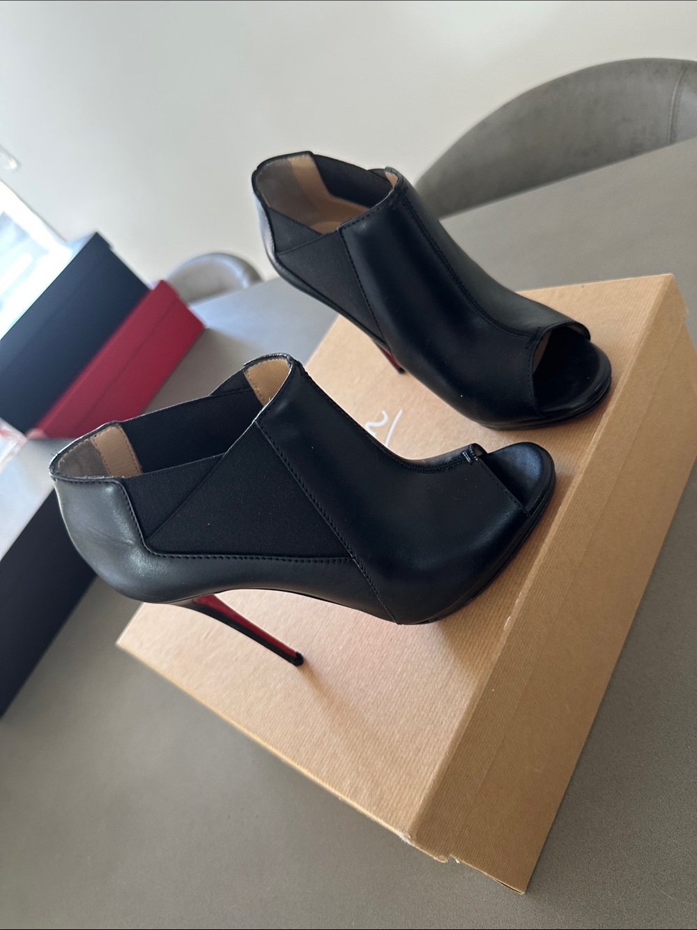 Christian Louboutin Black Peep-Toe Stiletto Booties with Red Soles